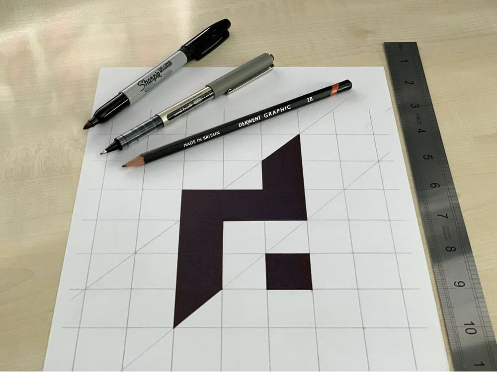 DESIGN DPI brand mark, gridded out old school with pencil and ink